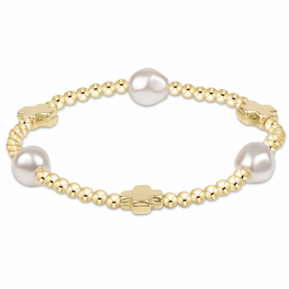 Gold bracelet with pearls on a white background by enewton 