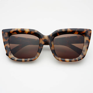 Tortoiseshell sunglasses with brown lenses on a white background