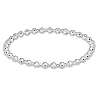 Silver beaded bracelet on a white background by enewton