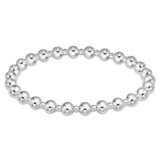 Silver beaded bracelet on a white background by enewton