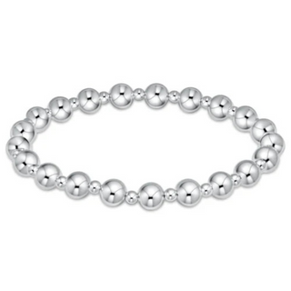 Silver beaded bracelet on a white background by e newton