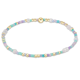 Bracelet with multicolored beads on a white background